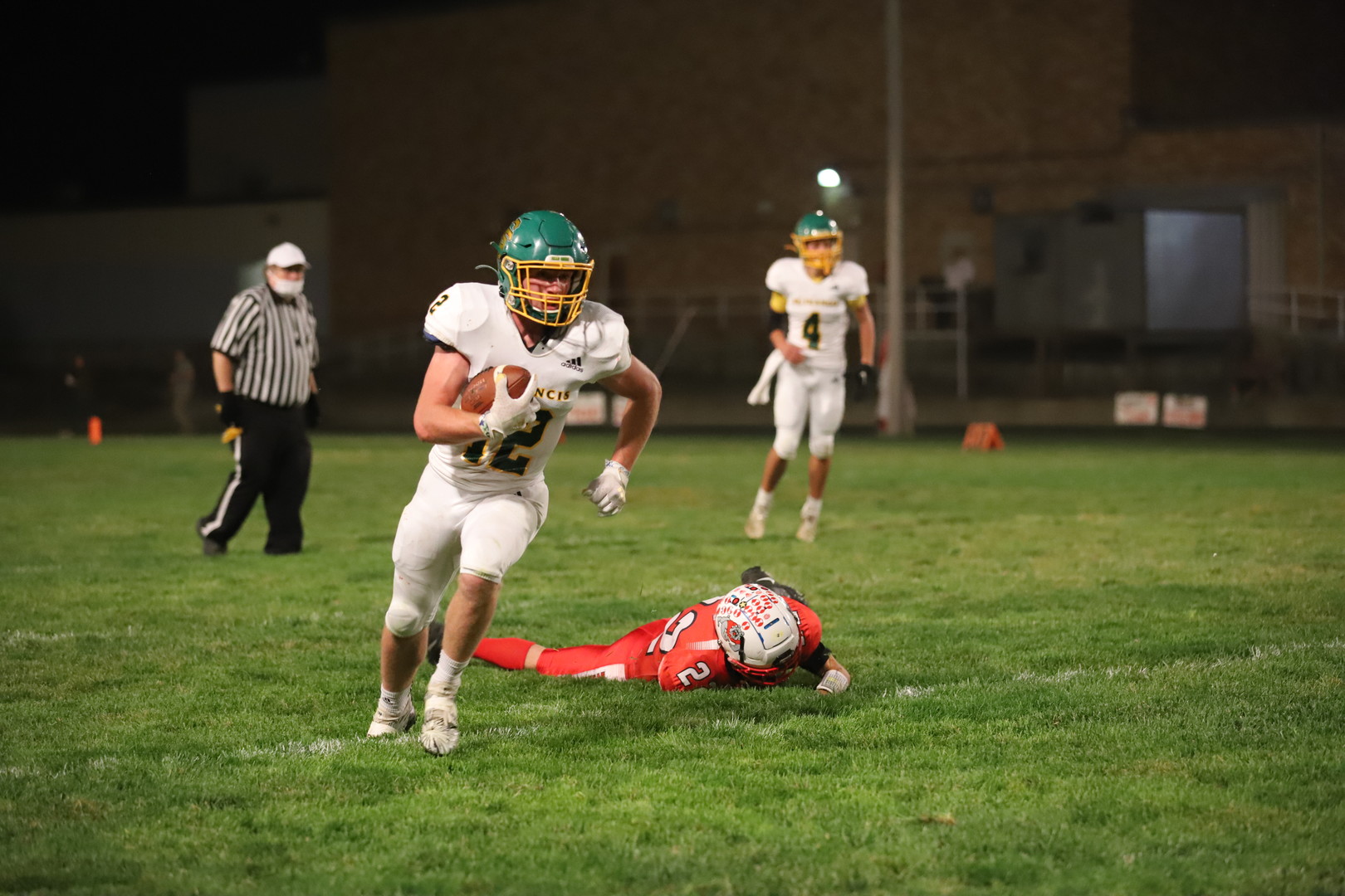 Adam Krien, senior, runs the ball to the goal line.