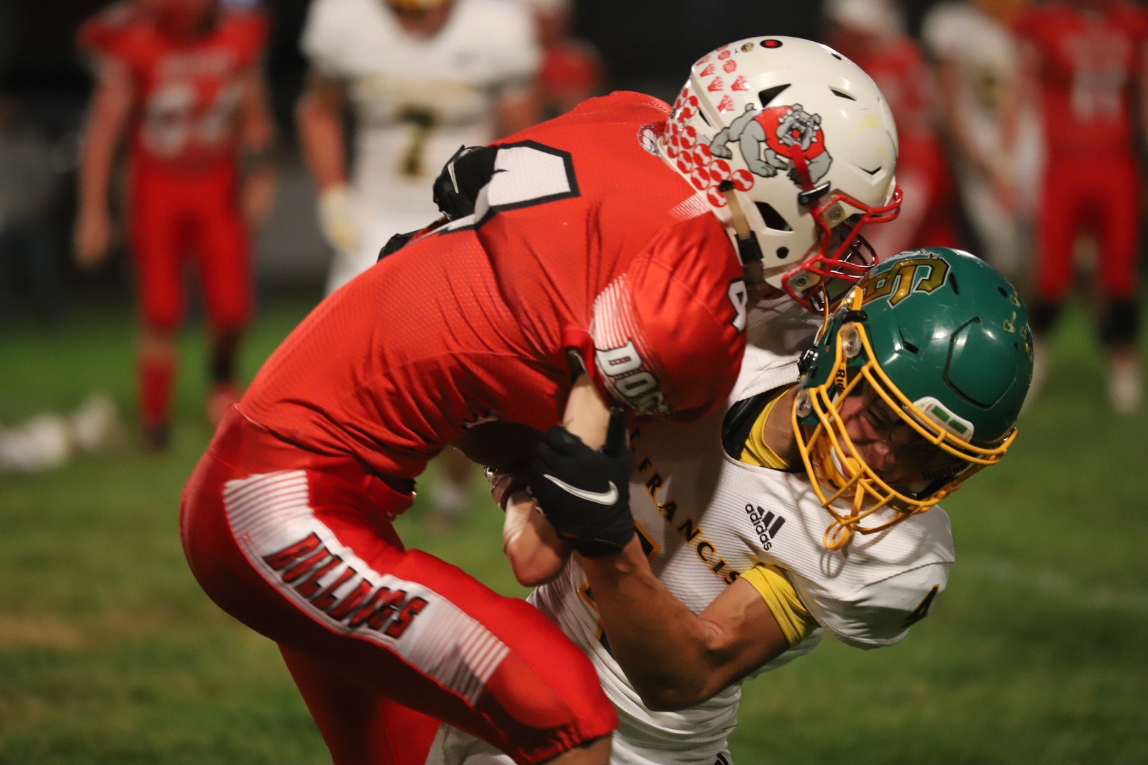 Adam Krien, senior, runs the ball to the goal line.